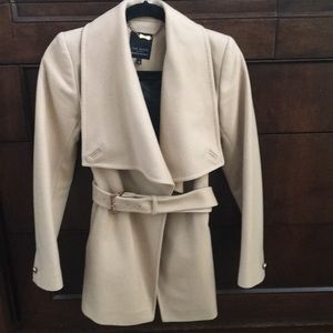 Camel color wool coat.